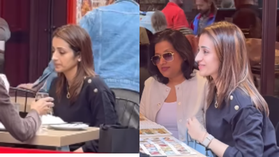 Trisha Krishnan enjoys casual outing with friends in London's Chinatown as netizens debate over privacy after her video is shared online - WATCH