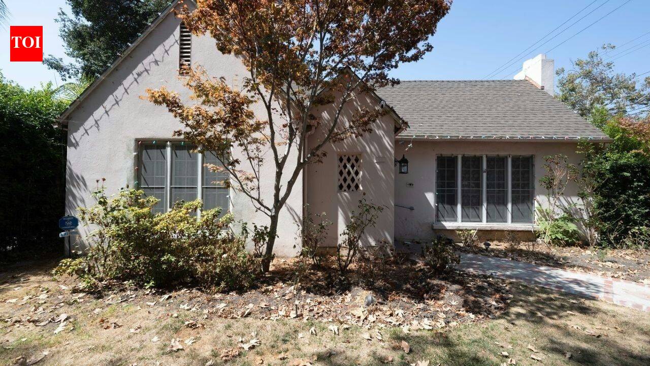 A California family bought a $1 historic house and moved it onto their burned property
