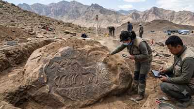 China discovers a rare four-horse chariot carved into a buried rock; fewer than 20 chariot scenes were known in the Helan Mountains
