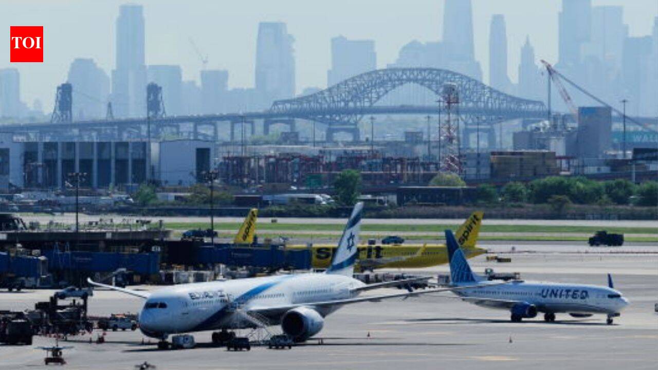 13 injured as shuttle bus crashes into barrier at Newark Airport