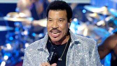 Lionel Richie hospitalized in ICU after St Louis concert, doctors investigate possible dehydration after 77-year-old singer reportedly needed a chair during All Night Long