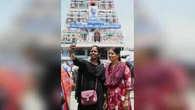 Mobile phone ban gets mixed response from devotees
