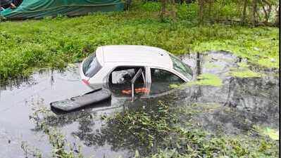 Couple dies after car plunges into water-filled pit