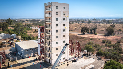 In 2025, UC San Diego shook a 10-story steel building 18 times, then set two floors ablaze to test if tall cold-formed-steel buildings were safe; the load-bearing frame held intact
