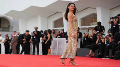 Kendall Jenner turned heads in the simplest golden dress at Venice Film Festival