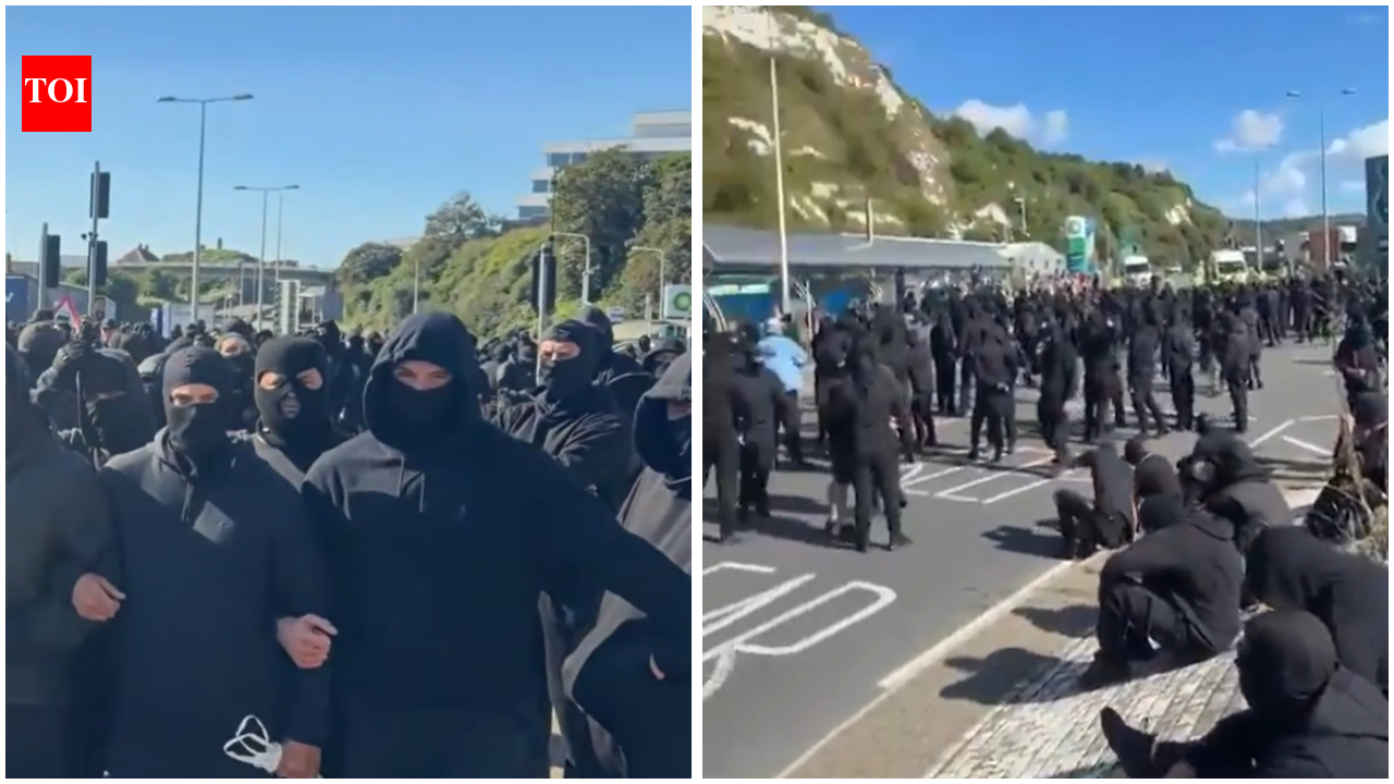 ‘Stop the boats’: Masked men block roads to Dover port in anti-immigration protest