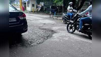 Deep craters and waterlogging make commute a nightmare on internal roads in Gurgaon Sector 14