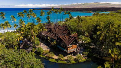 In 1994, 280 craftsmen built a Balinese estate from Indonesian ironwood and teak; dismantled and shipped to Hawaii, it was rebuilt with more than 1 million shingles and is now asking $32.5 million