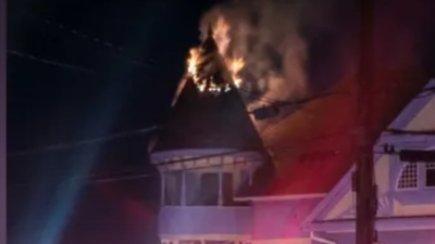 Lightning struck an 1890 Georgia mansion; its owners drove away unaware the turret was burning until passersby spotted flames, and firefighters kept the main floor undamaged
