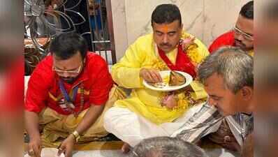 CM prays at Kalighat temple, has fish-basanti pulao prasad