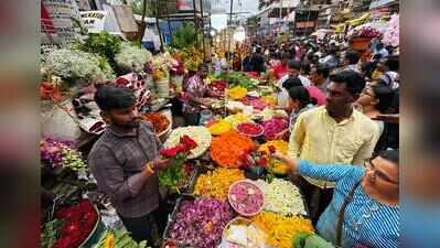 Colour, scent of flowers fill markets, demand during puja increases cost