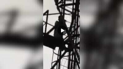 Man climbs mobile tower demanding permission to marry GF