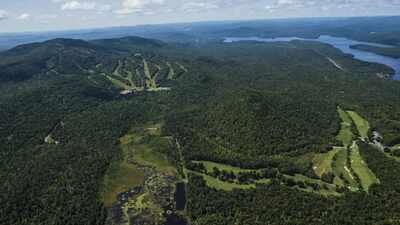Developers once planned Adirondack Park’s largest residential project on 5,800 New York acres; after years of failure and foreclosure litigation, the land is headed for public auction