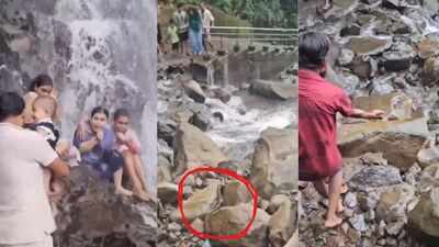 Giant snake falls on man carrying child at Amboli waterfall in Maharashtra; tourists scream, “Run, it’s a very big cobra”: watch