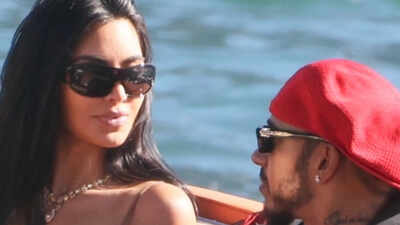 Lewis Hamilton and Kim Kardashian enjoy Lake Como boat ride and visit Villa Balbianello before heading to Paris for dinner date at celebrity hotspot Ferdi
