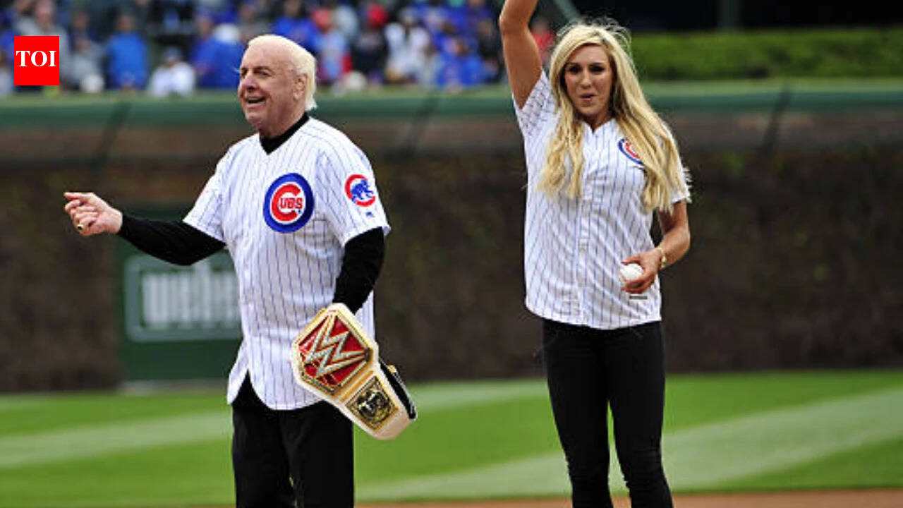 Charlotte Flair and Ric Flair