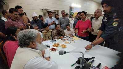 Vij orders suspension of 2 cops over delayed FIRs at public hearing
