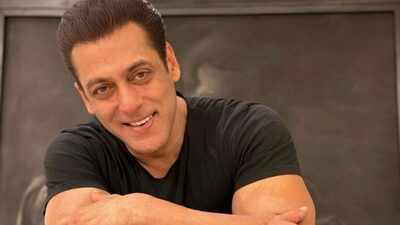 Salman Khan folds his hands as the crowd surrounds him after Ganpati darshan; asks security to protect children as young fans gather to catch his glimpse