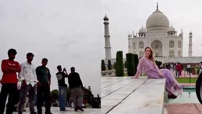 Photographer confronts crowd surrounding foreign female tourist at Taj Mahal; video sparks debate on "Civic Sense"