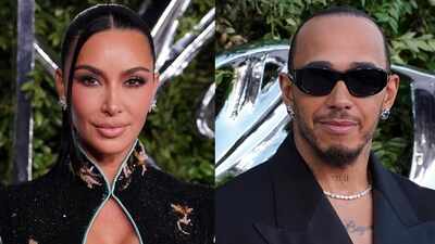 Kim Kardashian and Lewis Hamilton share a kiss at George Lucas' museum opening night - WATCH