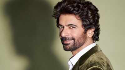 INSIDE Sunil Grover's Rs 2.5 crore Mumbai home; double-height living room with city views; hand-painted murals and unique dining setup