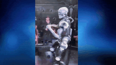Robot vs human: Humanoid robot throws punches, kicks influencer across cage - video