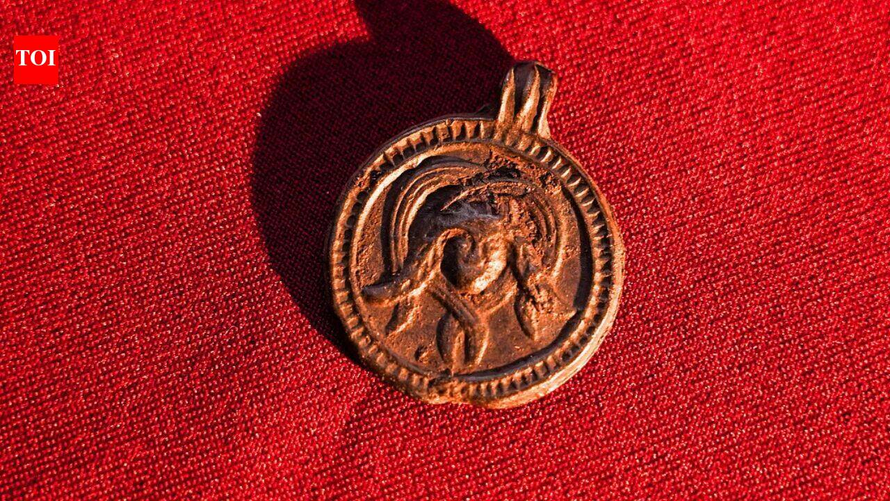 Archaeologists found an pendant in Russia showing a Christian saint and a Medusa-like figure