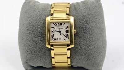 A Cartier watch was found inside a British charity-shop donation bag; it was authenticated as an 18-carat gold watch and sold for £9,766