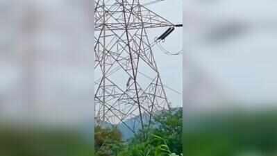Woman climbs 50-ft high-tension tower after married lover refuses to marry her