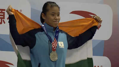 Roshibina Devi assures medal after second chance, one win away from Asian Games final
