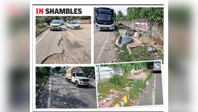 Broken carriageway, parking chaos, potholes choke key Udyog Vihar link