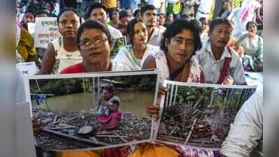 Rally in city seeks adequate aid for flood victims