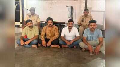 4 held for attacking cop after honking, headlight row