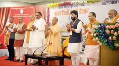 Yogi felicitates five Bharat Taxi Saarthis
