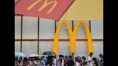 McDonald's says its AI-enabled drive-thru system can now take orders in English and Spanish with 90% accuracy; it could save at least 50 labour hours a week; CFO Ian Borden notes that company has no intention to reduce staff