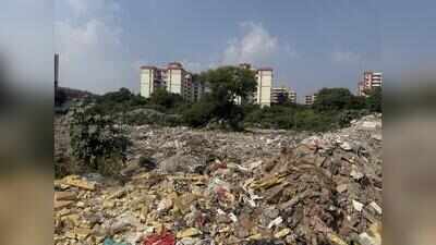 No checks, no clearing: Construction waste mounts on GCR Extn, Rajesh Pilot Road