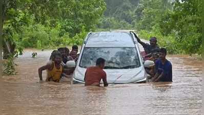 Teacher swims to safety as floodwaters sweep away car, driver rescued after 2 hours