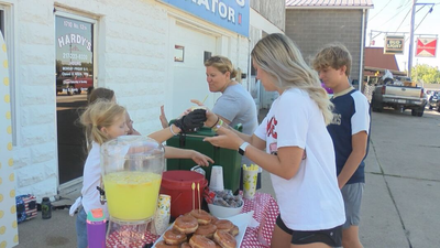At age 6, Grace Hendrian opened a lemonade stand hoping to raise $10 for the Salvation Army; seven summers later, she and sister June closed the project after turning that tiny goal into about $55,000