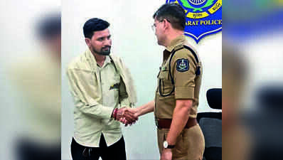 Police honour man for rescuing 17 from burning bus