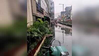 Drains choked, water flows back to flood roads in Shalimar Garden