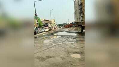 Road used by office-goers, school kids riddled with potholes
