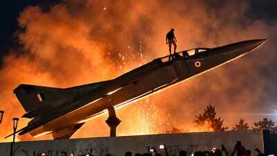 Students atop MiG-23, military tank: Dramatic visuals from LPU capture protesters torching vehicles
