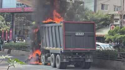Close shave for rider as bike, truck catch fire Iin Bengaluru