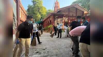 Income Tax officials clean Sarasbaug temple premises