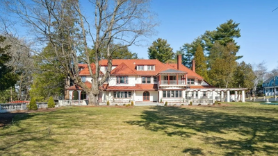 A 1914 Massachusetts mansion built after a high-society scandal is listed for $3.5 million; the 10,269-square-foot estate has 12 bedrooms, Italian gardens and a 39-foot ballroom
