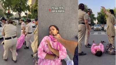 “I want to hug Vijay Thalapathy then die”: Woman lies down at Delhi traffic signal near Jantar Mantar, refuses to move until Tamil Nadu CM hugs her; watch