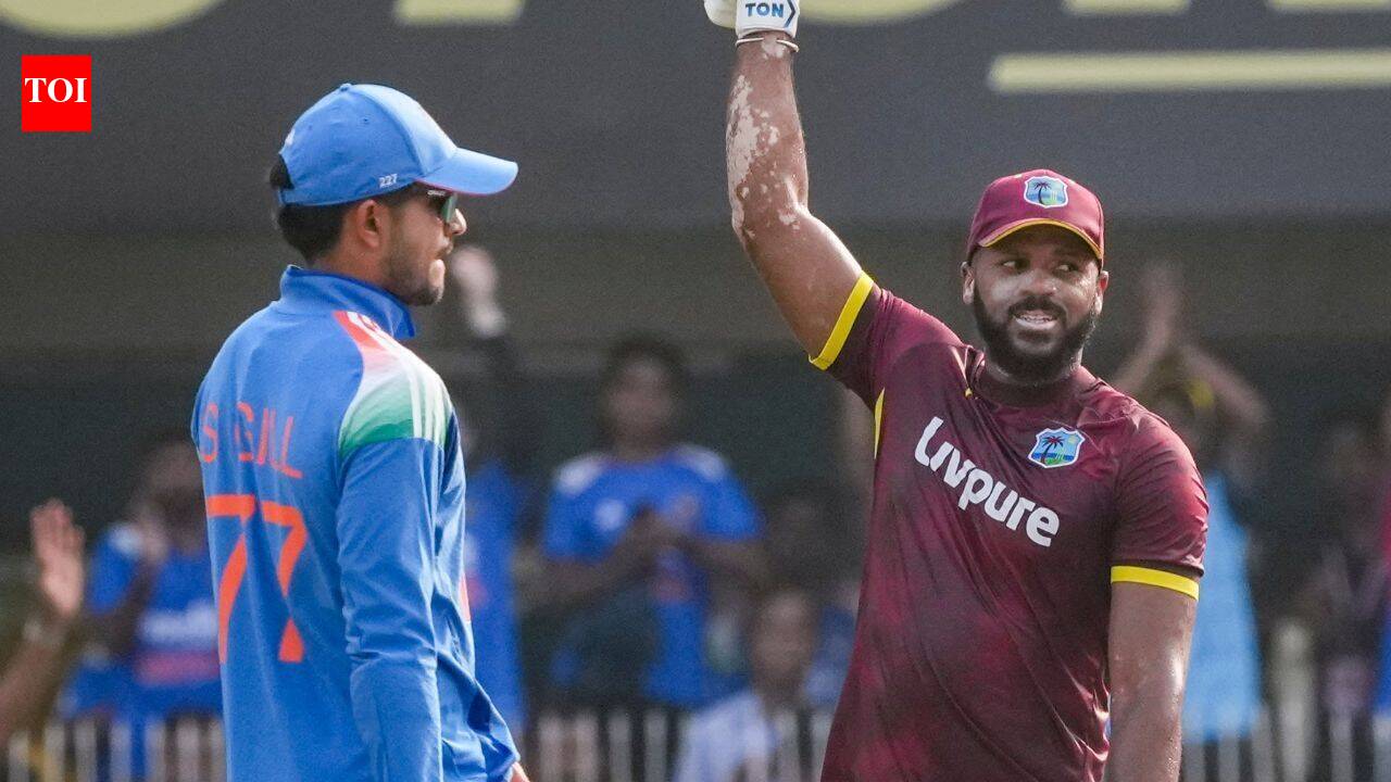 John Campbell celebrates his record-breaking 65-ball century against India in the second ODI at Guwahati