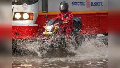 Bengaluru sees flooded roads, fallen trees & traffic snarls