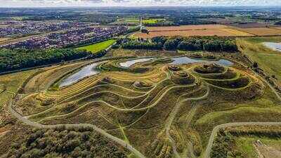 Northumberland’s ‘Lady of the North’ captured in new drone images as the world’s largest female-form land sculpture, rising 100 feet and built from 1.5 million tonnes of rock and soil from the former Shotton Surface Mine
