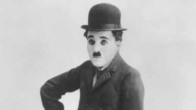 Motivational quote of the day by Charlie Chaplin: “You’ll never find a rainbow if you’re looking down,” a powerful reminder to keep looking up and stay hopeful